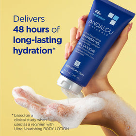Andalou Naturals bottle held in hand to show 8.5 fl oz scale