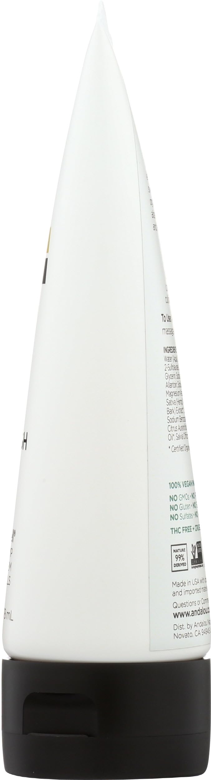 Andalou Naturals size scale with hand showing 6 ounce portability and travel convenience