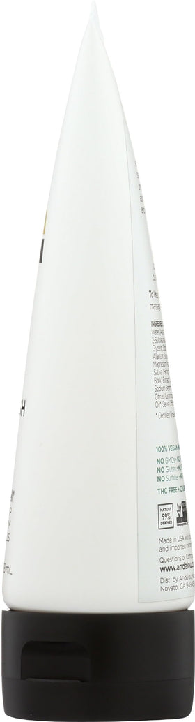 Andalou Naturals size scale with hand showing 6 ounce portability and travel convenience