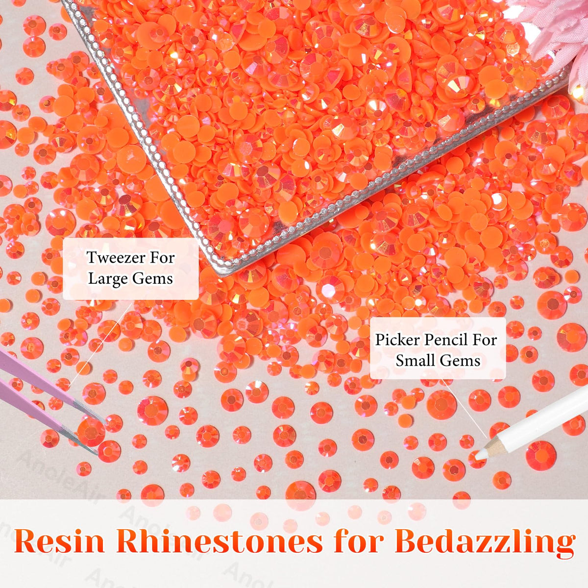 AnoleAir tweezer and pickup pencil arranged with gems for precise placement benefit