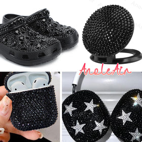Festival face art decorated with AnoleAir black rhinestones, creating dramatic contrast