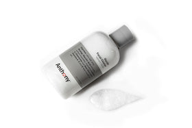 Anthony size scale bottle in hand shows 8 fl oz travel-friendly