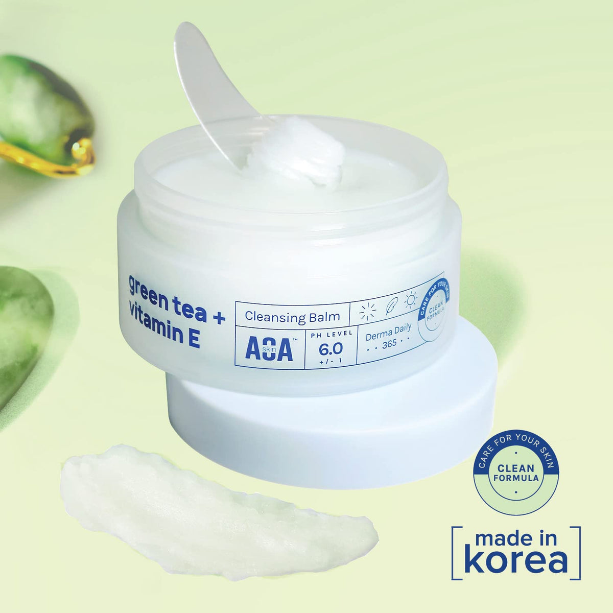 AOA STUDIO open jar with spatula demonstrating hygienic scoop
