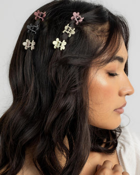 AOENJIE lifestyle image with kids and teen wearing clips, showing playful accessorizing benefit