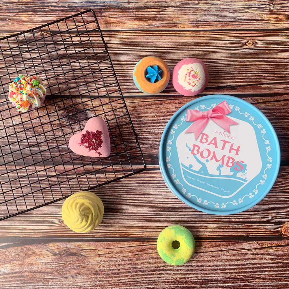 Group layout of six Aofmee bath bombs arranged to show color variety and scent selection