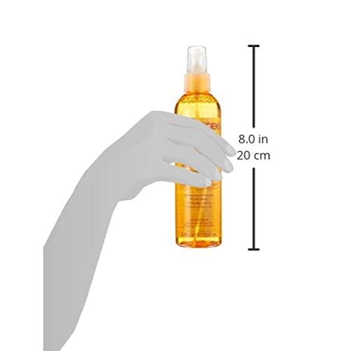 Aphogee product being applied to damp hair showing targeted treatment and reduced breakage benefit