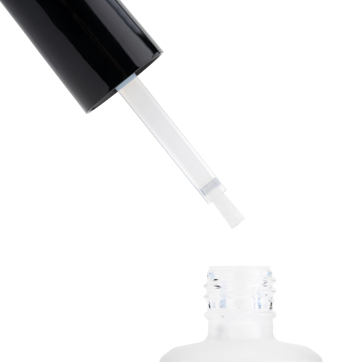 APRÉS pH Bonder being applied to a natural nail to improve adhesion and prevent lifting