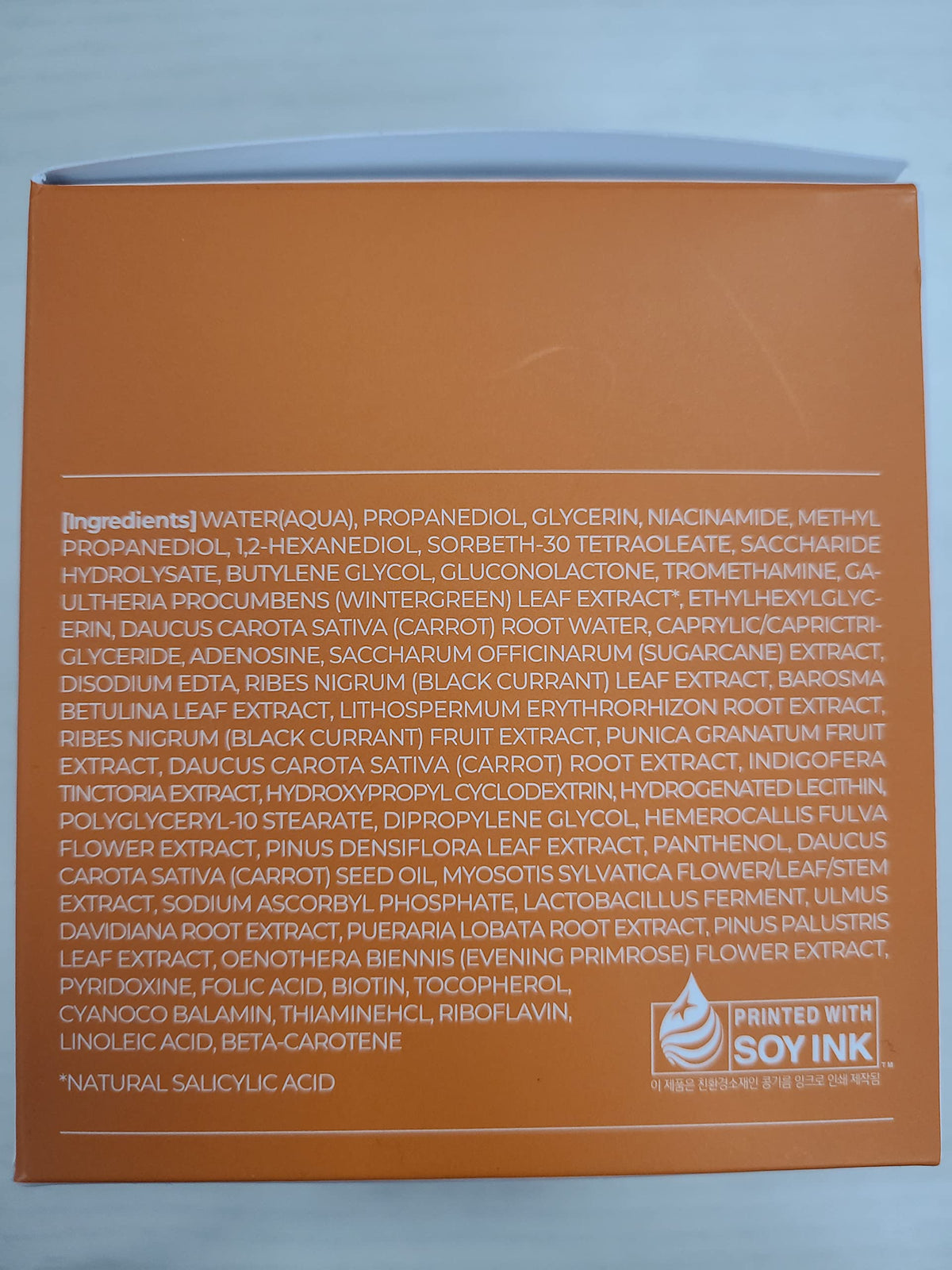 APRILSKIN ingredient label with carrot complex and exfoliant benefits