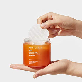 APRILSKIN swipe of pad on skin showing gentle exfoliation benefit