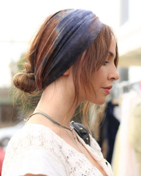AQOKKA model wearing headband demonstrating everyday styling benefit