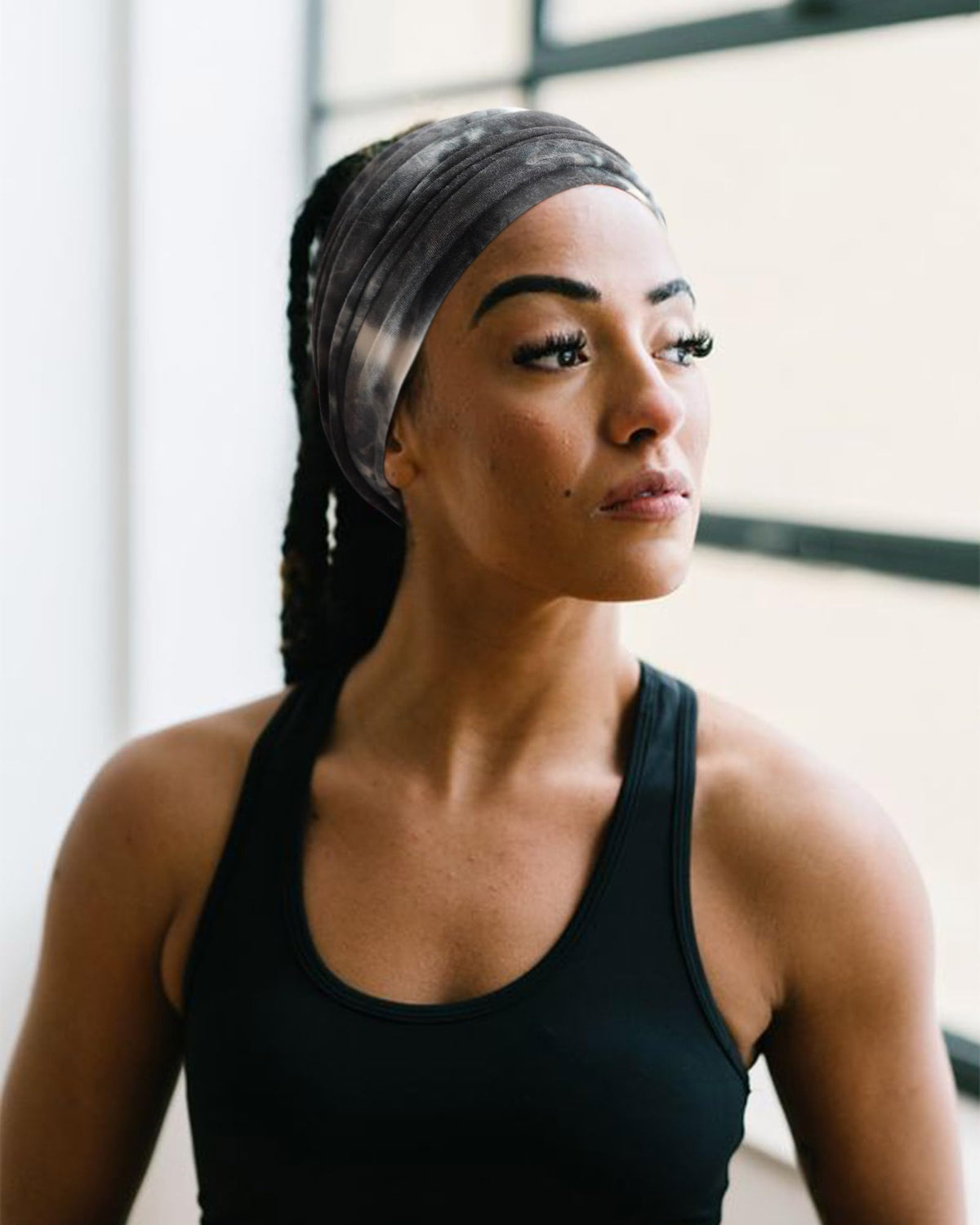 AQOKKA headband used during yoga showing non-slip hold advantage