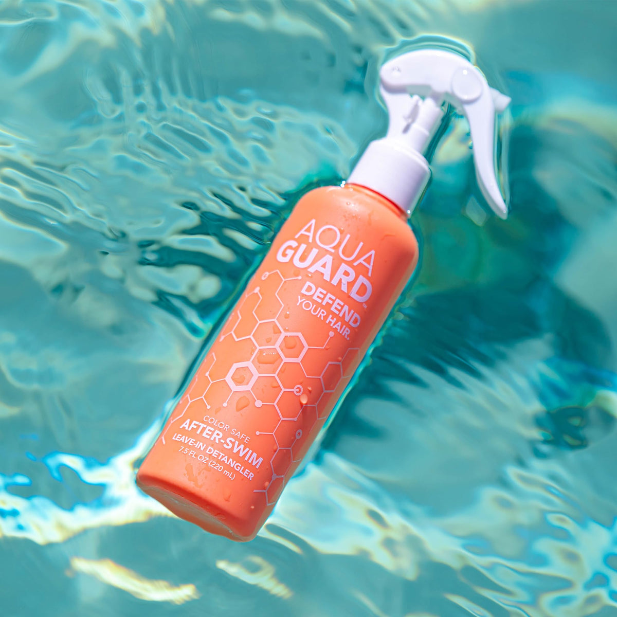 AQUA GUARD mist on damp hair showing detangling benefit after swimming
