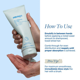 Stylist blow-drying hair with Aquage gel to create smooth, frizz-controlled finish