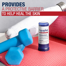 Aquaphor balm stick on lips illustrating soothing protection for chapped lips