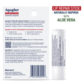 Person outdoors applying Aquaphor lip stick indicating protection in wind
