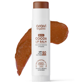 Aravi Organic front view of nude cocoa lip balm showing compact stick and tint benefit