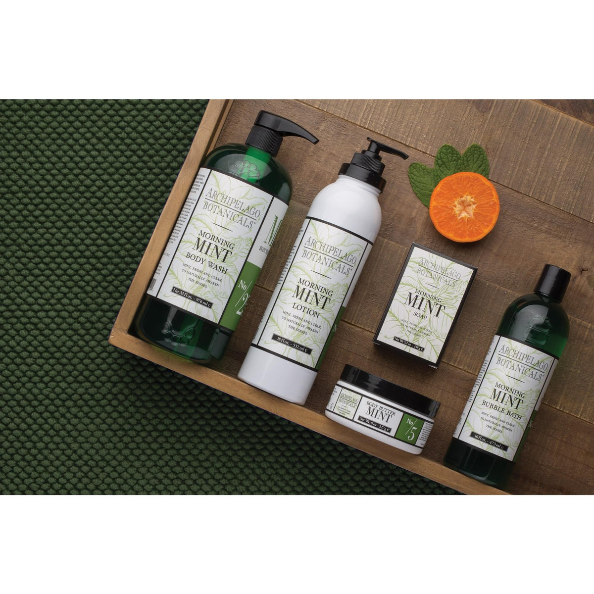 Archipelago Botanicals body wash on loofah demonstrating gentle cleansing