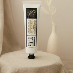 archipelago botanicals hand crème being massaged into hands for immediate hydration