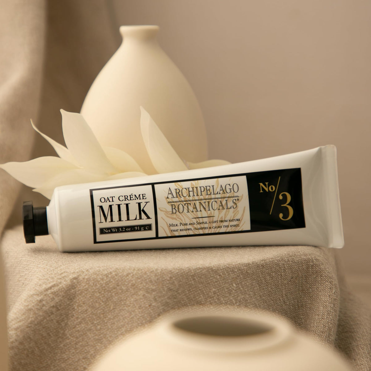 archipelago botanicals tube with cream dispensing to show easy application