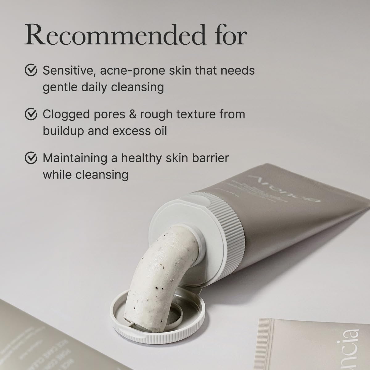 ARENCIA on a bathroom vanity with towel showing everyday skincare placement