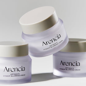 ARENCIA jar on nightstand lifestyle shot suggesting nightly repair benefit