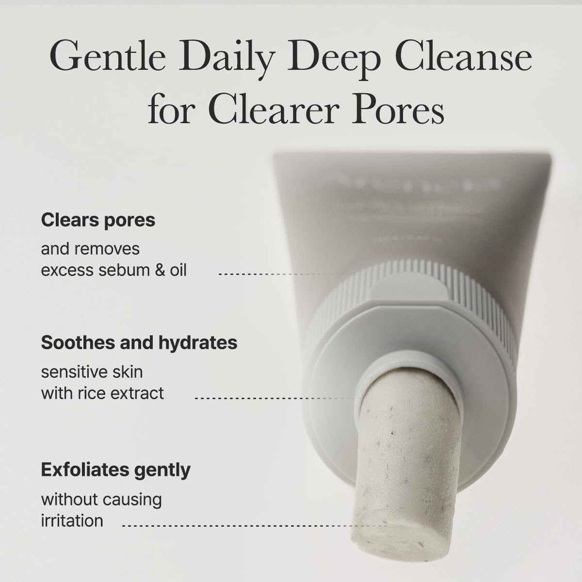 ARENCIA pouring cleanser onto hand to show thick, spreadable consistency and control