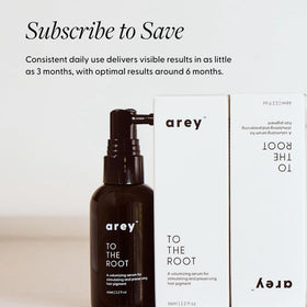 Arey bottle on bathroom counter lifestyle shot implying daily routine convenience