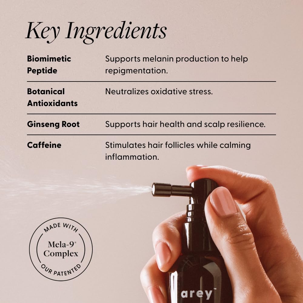 Applying Arey serum to scalp demonstrating targeted use for pigment support