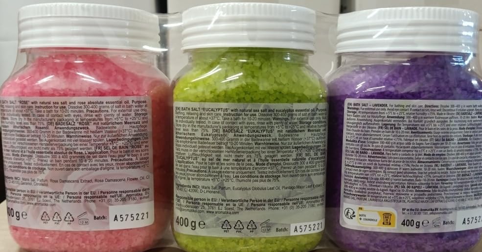 AROMATIKA lifestyle bath scene with candles illustrating calming home spa benefit