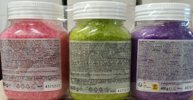 AROMATIKA lifestyle bath scene with candles illustrating calming home spa benefit