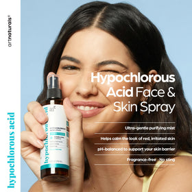Artnaturals 8 fl oz bottle in hand showing travel-friendly size