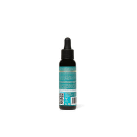 As I Am bond oil next to ruler showing 2 fl oz size and portability benefit