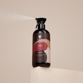 As I Am texture droplet on palm showing lightweight non-greasy hydration