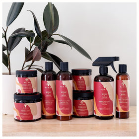 As I Am conditioner being applied to wet hair improving detangling and hydration