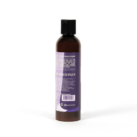 As I Am applied to wet textured hair showing improved detangling and manageability