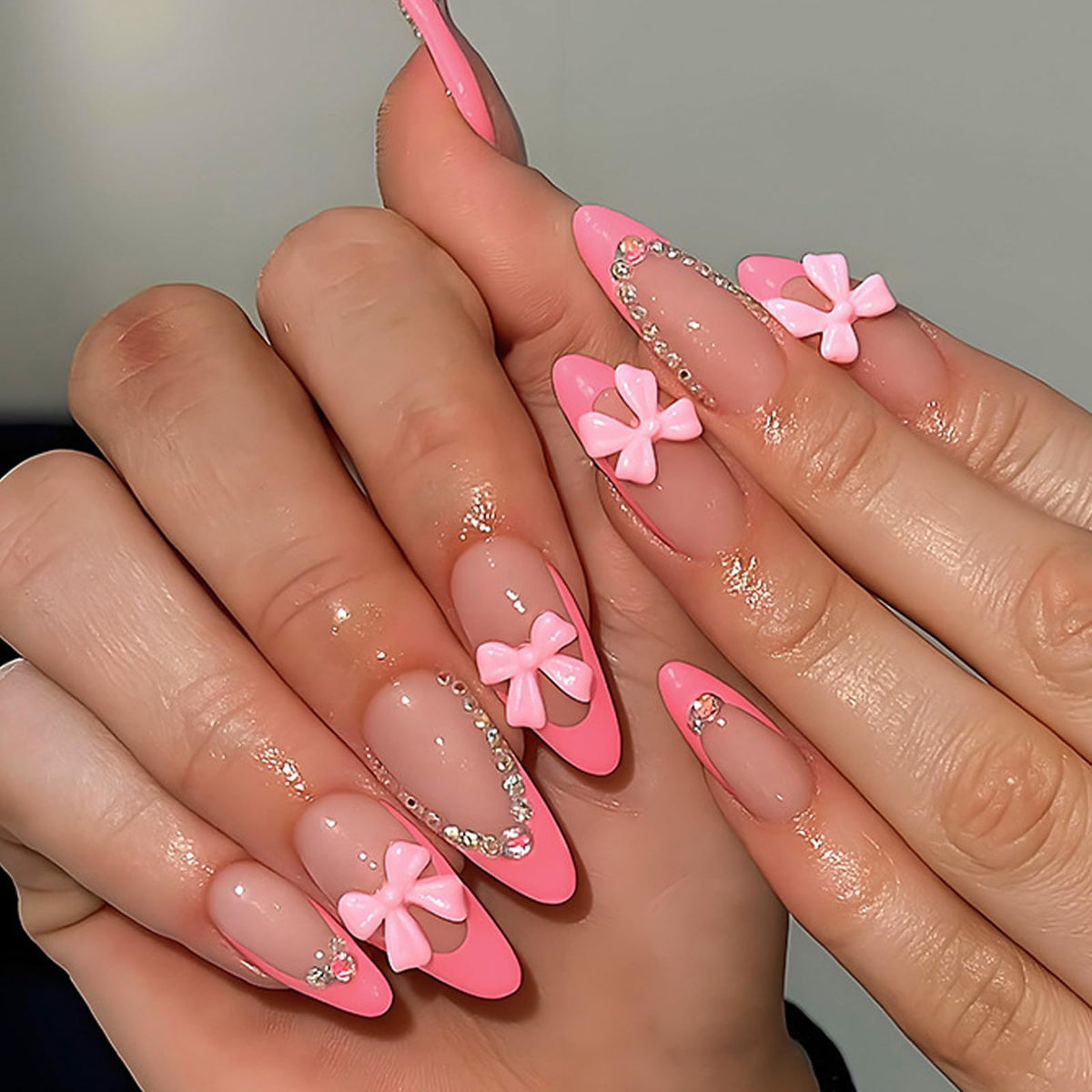 Ashowner model applying press-on nails demonstrating quick application