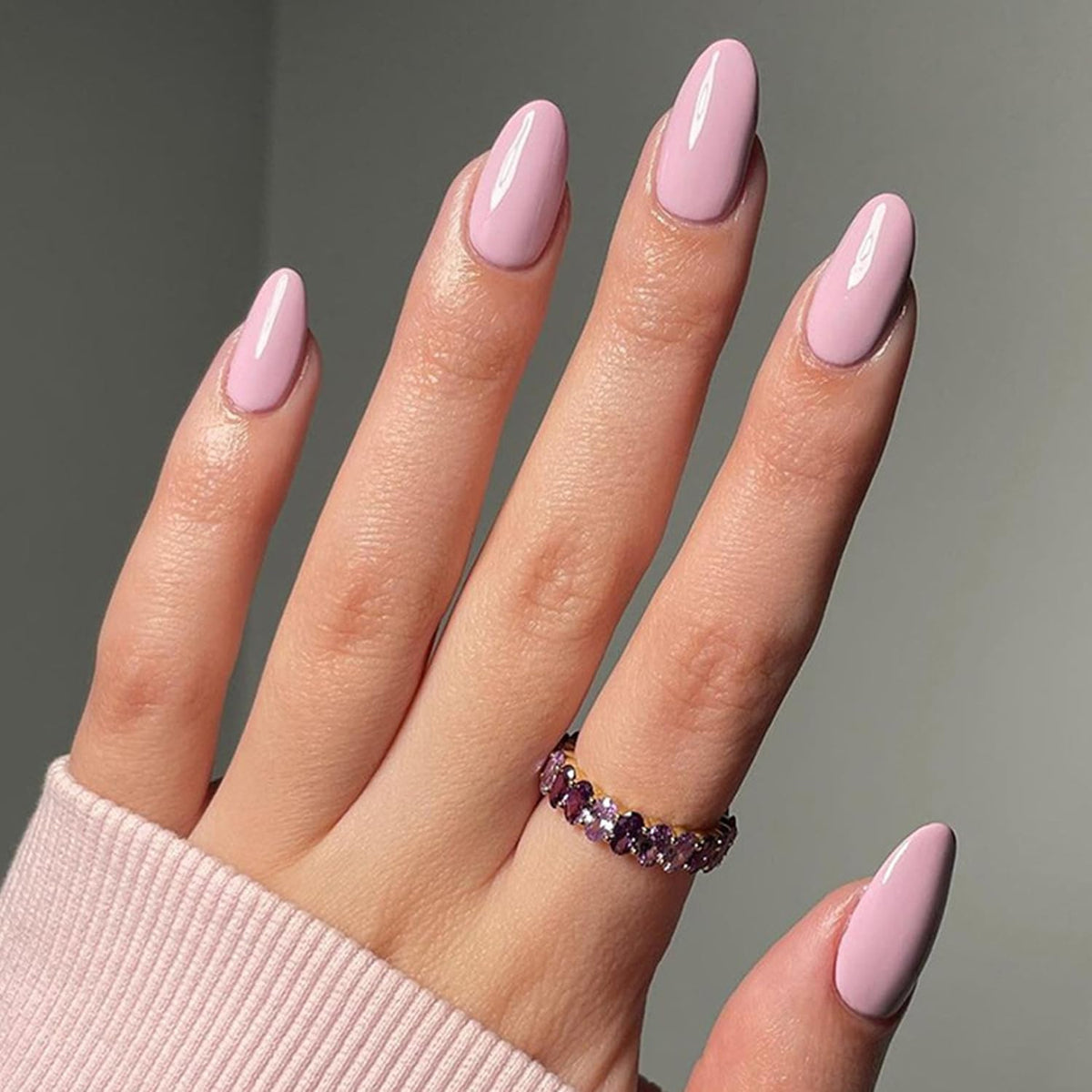 Ashowner side profile of almond-shaped nail showing comfortable curvature and length