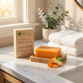 Bathroom shelf with Aspen Kay soap offering a natural self-care visual