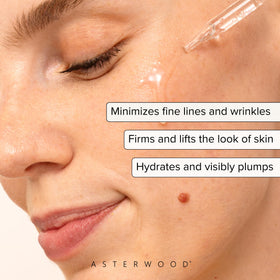 Asterwood dropper dispensing clear serum for precise application benefit