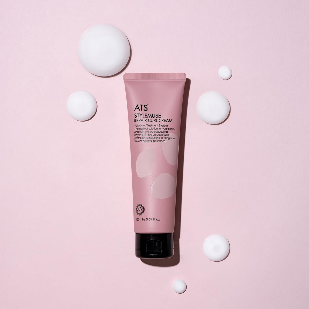 ATS Professional cream on hand demonstrating application and slip for detangling