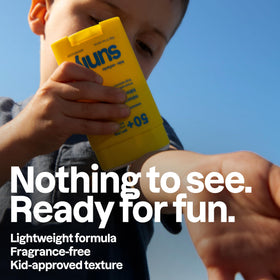 ATTITUDE being applied to a child cheek offering quick, targeted sun protection