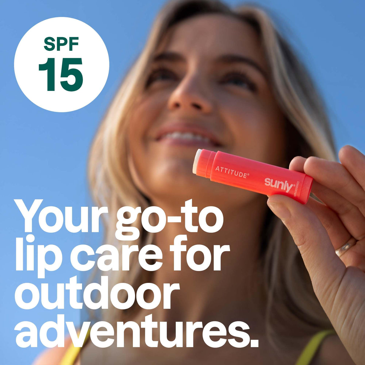 ATTITUDE lip balm in hand showing pocket-friendly size and portability
