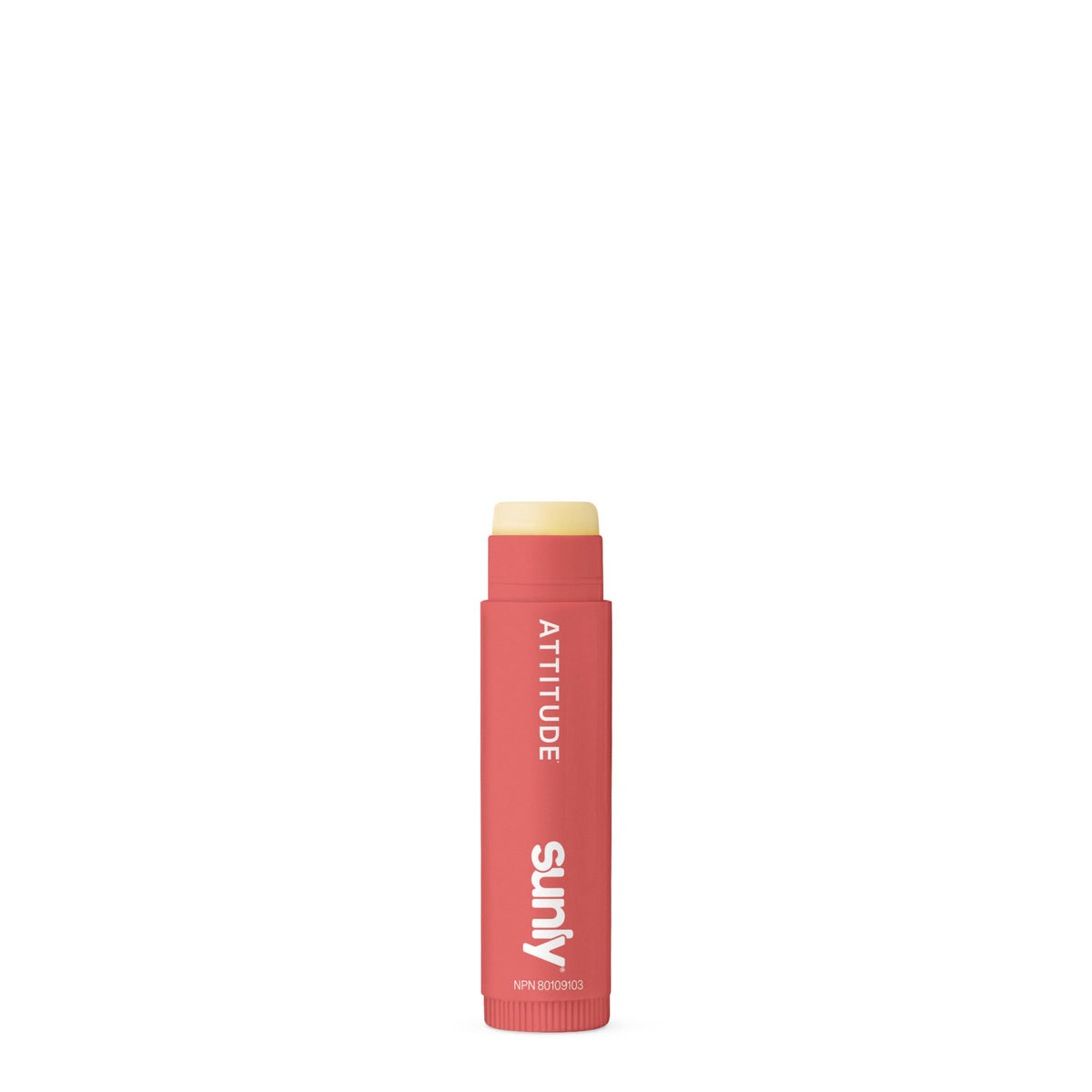 ATTITUDE lip balm on beach towel demonstrating sun protection during outdoor use