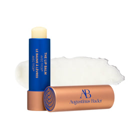 Augustinus Bader lip balm front tube showing sleek packaging and brand