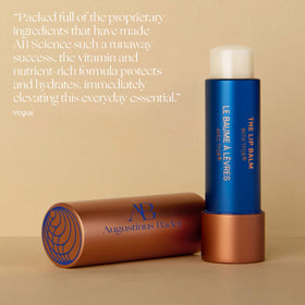 Augustinus Bader lip balm on bedside table indicating overnight hydration