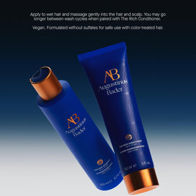 Augustinus Bader product amid towels and flowers conveying calming scent experience