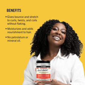 Aunt Jackie's gel being applied to damp textured hair for definition