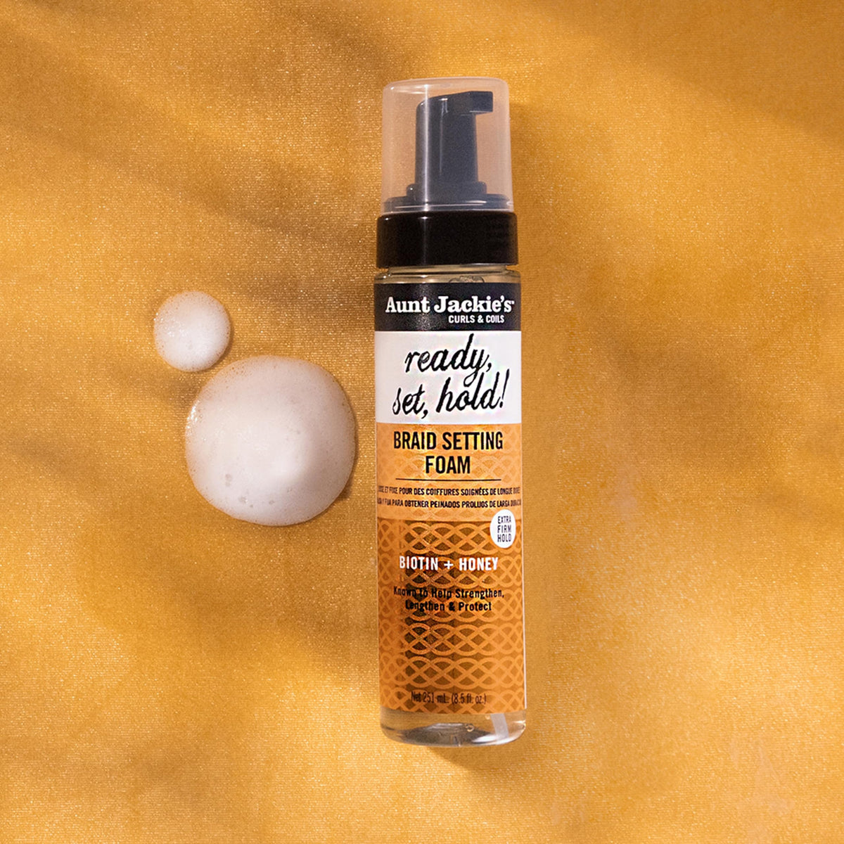 Aunt Jackie's foam used with a styling wrap during on-scalp blow-drying for smooth roots