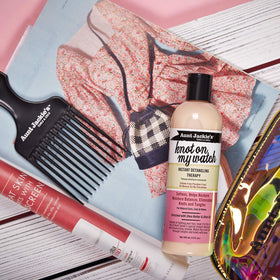 Aunt Jackie's applied to wet curl demonstrating easier combing benefit