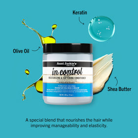 Aunt Jackie's creamy conditioner texture poured to show rich slip and moisture